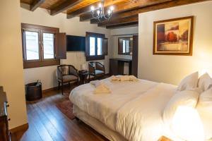 Postel nebo postele na pokoji v ubytování Guesthouse Lousios