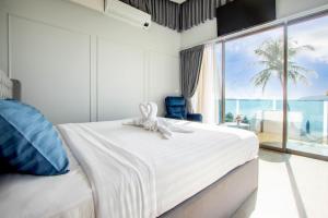 Postelja oz. postelje v sobi nastanitve 【Beach Front】海景沙滩别墅，私人泳池，免费早餐，女佣每日清洁，生活方便交通便利