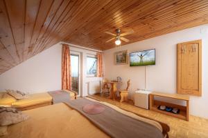 Letto o letti in una camera di Rooms & Apartments Pr Matjon