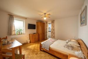 Letto o letti in una camera di Rooms & Apartments Pr Matjon