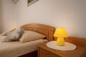 Letto o letti in una camera di Rooms & Apartments Pr Matjon