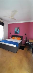 Giường trong phòng chung tại Bolagala Nature Resort