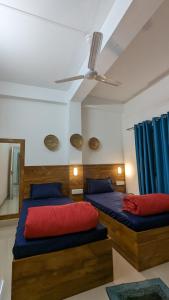 Postel nebo postele na pokoji v ubytování Mezenga 2 - Premium Backpackers Hostel