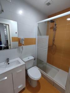 a bathroom with a toilet and a shower and a sink at benimaclet delux3 in Valencia