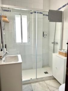 Koupelna v ubytování Alojanómadas Jerez Centro + 18 fotografií