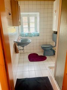 Kúpeľňa v ubytovaní Kellerstöckl am Rosenberg Romantik pur