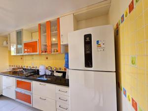 Kuchyň nebo kuchyňský kout v ubytování Maná da Concha Apartamento