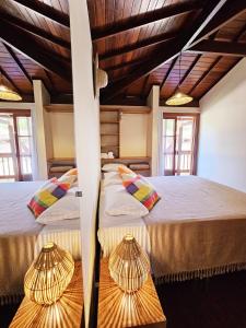 Postel nebo postele na pokoji v ubytování Maná da Concha Apartamento