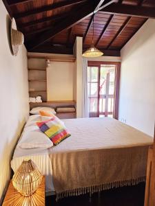 Postel nebo postele na pokoji v ubytování Maná da Concha Apartamento