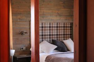 Letto o letti in una camera di Hotel Calitxo