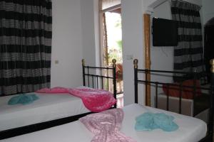 Postel nebo postele na pokoji v ubytování Villa Ayche