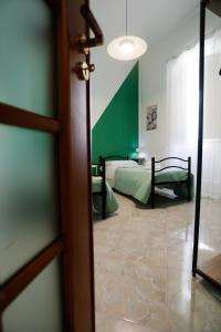 A bed or beds in a room at Biddizzi