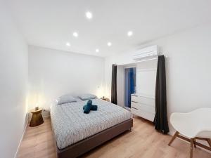 Кровать или кровати в номере Zoé T3 Victor Hugo Clim Hypercentre