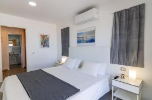 Postel nebo postele na pokoji v ubytování Mirador Balcon del Atlantico y piscina privada