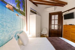 Postel nebo postele na pokoji v ubytování Mirador Balcon del Atlantico y piscina privada
