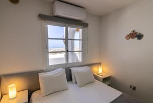 Postel nebo postele na pokoji v ubytování Mirador Balcon del Atlantico y piscina privada