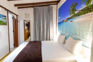 Postel nebo postele na pokoji v ubytování Mirador Balcon del Atlantico y piscina privada