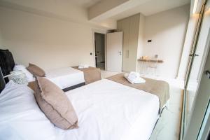 Posteľ alebo postele v izbe v ubytovaní Imperial House - Hersonissos Center - Sleeps 8