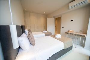 Posteľ alebo postele v izbe v ubytovaní Imperial House - Hersonissos Center - Sleeps 8