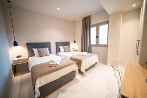 Posteľ alebo postele v izbe v ubytovaní Imperial House - Hersonissos Center - Sleeps 8 + 14 fotografií