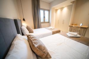 Posteľ alebo postele v izbe v ubytovaní Imperial House - Hersonissos Center - Sleeps 8