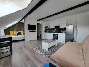 Η κουζίνα ή μικρή κουζίνα στο Bienvenue à Reims type studio charmant et lumineux 2eme étage +3 φωτογραφίες