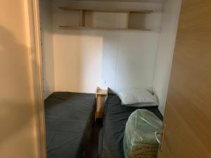 Postel nebo postele na pokoji v ubytování Mobil-Home -10 minutes Océan