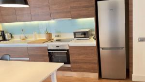 Kuchyňa alebo kuchynka v ubytovaní Captains 2-Bedroom Suite in Athens Nea Smyrni
