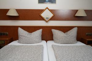 Postel nebo postele na pokoji v ubytování Hotel Plovdiv