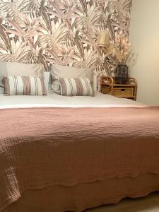 En eller flere senge i et værelse på Hotspot 83