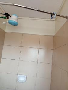 Un baño de Mvuli suites studio