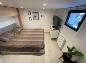 Katil atau katil-katil dalam bilik di Welcome appartement neuf mars 2024