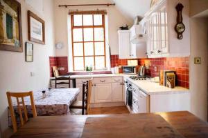 Köök või kööginurk majutusasutuses Ghleann Éada Cottage