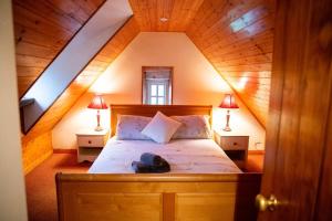 Voodi või voodid majutusasutuse Ghleann Éada Cottage toas