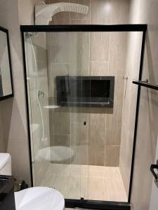 A bathroom at Flat que acomoda até 4 pessoas Boa Viagem-Recife