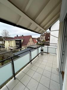 a balcony with a view of a building at Ferienwohnungen in Heidenheim in Heidenheim an der Brenz