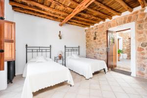 Posteľ alebo postele v izbe v ubytovaní Agroturismo Can Gall
