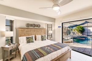 Ένα ή περισσότερα κρεβάτια σε δωμάτιο στο 4-bed Serenity Punta Gorda Retreat! +57 φωτογραφίες