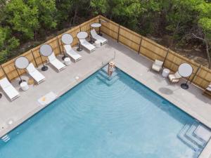 an overhead view of a person swimming in a swimming pool at Ofland Escalante in Escalante