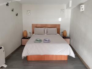 เตียงในห้องที่ Apartamento La Machacona TENERIAS