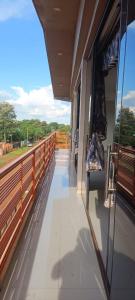 a train platform with a view of a fence at Ñande renda in Ciudad del Este