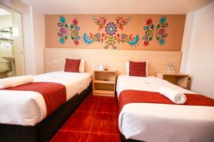 Postel nebo postele na pokoji v ubytování Mayu Boutique Hotel
