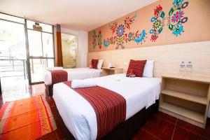 Postel nebo postele na pokoji v ubytování Mayu Boutique Hotel