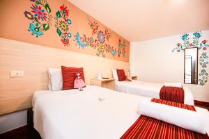 Postel nebo postele na pokoji v ubytování Mayu Boutique Hotel