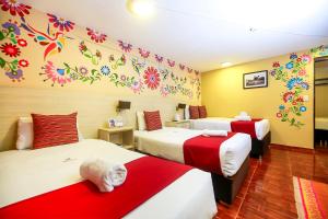 Postel nebo postele na pokoji v ubytování Mayu Boutique Hotel