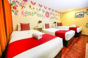 Postel nebo postele na pokoji v ubytování Mayu Boutique Hotel
