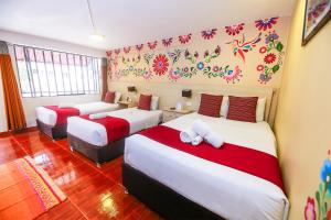 Postel nebo postele na pokoji v ubytování Mayu Boutique Hotel