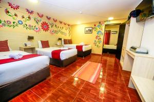 Postel nebo postele na pokoji v ubytování Mayu Boutique Hotel