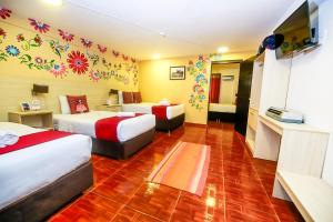 Postel nebo postele na pokoji v ubytování Mayu Boutique Hotel