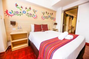Postel nebo postele na pokoji v ubytování Mayu Boutique Hotel